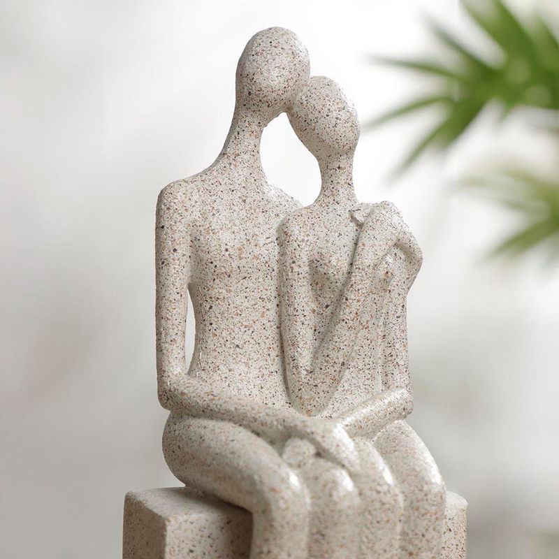 Figura Decorativa de Pareja Sentada