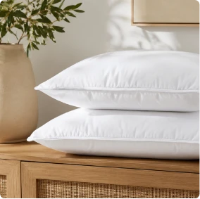 Almohadas cómodas para descansar mejor y complementar tu dormitorio.